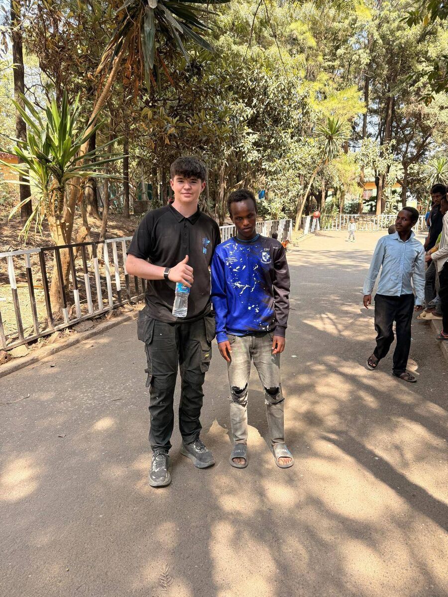 Glanmire: Ronnie Óg with one of the blind students in a Sars top