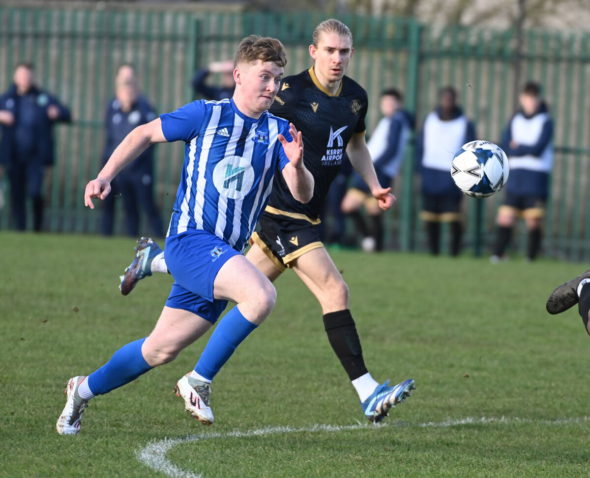 Leeds'  Dale Tynan racing onto the ball from Kerry's Jonas Hakkinen during the Grandons Toyota Munster Senior Cup clash. Picture: Eddie O'Hare