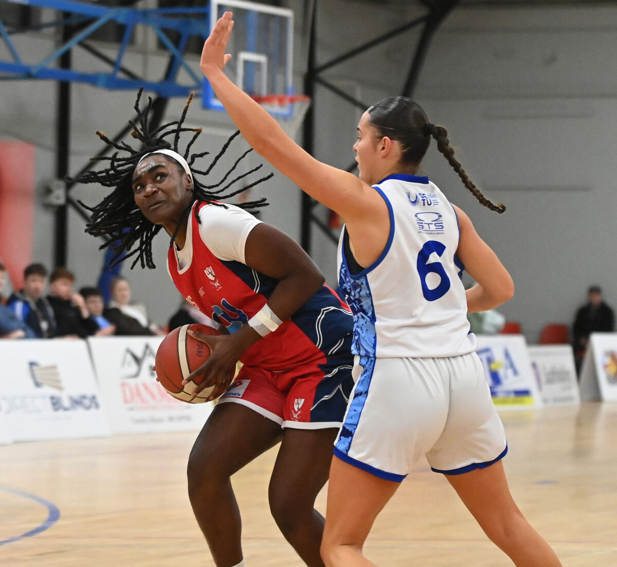 Gurranabraher Credit Union Brunell's Brailyn Jarrell Joseph looking for a way past Waterford Wildcats'  Sarah Hickey. Picture: Eddie O'Hare
