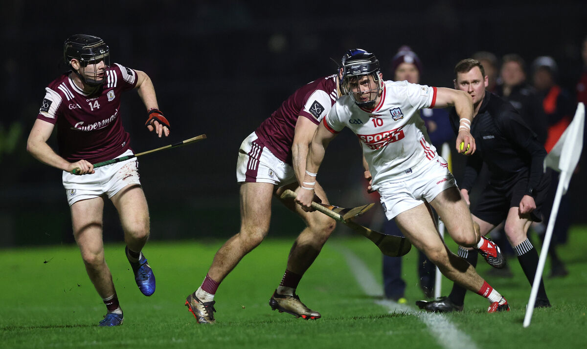 Galway’s Jason Rabbitte and Daniel Loftus try to halt Darragh Fitzgibbon of Cork. Picture: INPHO/James Crombie