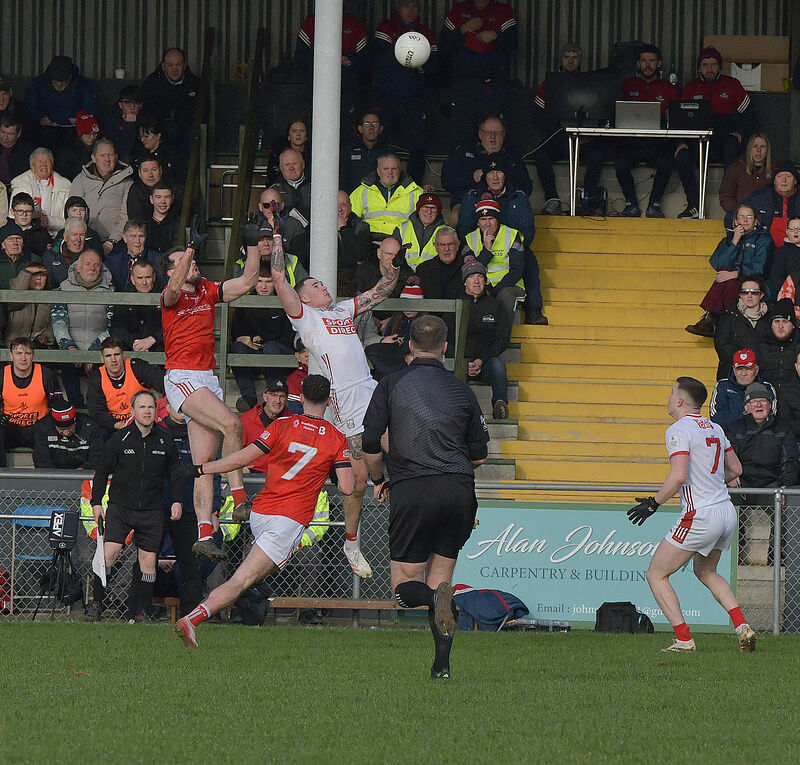 Cork's Seán Walsh and Louth's Conor Early in action. Picture: Moya Nolan Cork's Seán Walsh and Louth's Conor Early in action. Picture: Moya Nolan