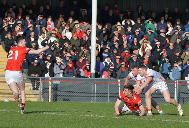  Cork's Rory Magurre and Brian Hurley fight for possession against Louth. Picture: Moya Nolan