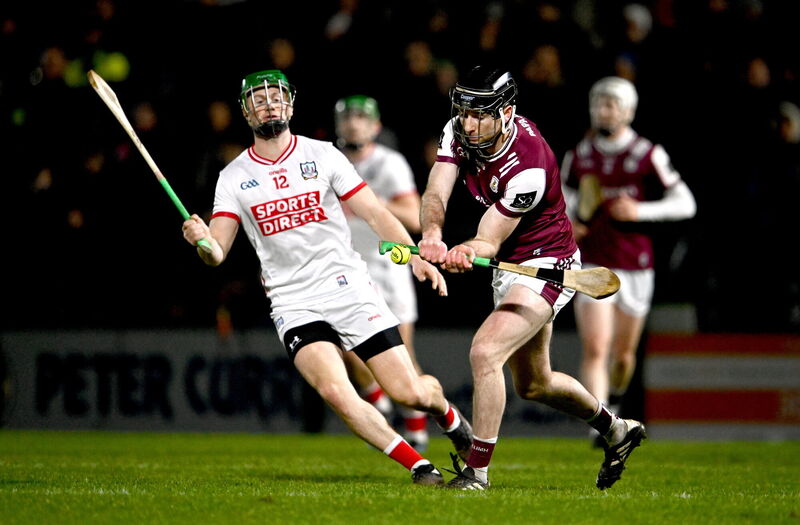 31 January 2026; Padraic Mannion of Galway in action against Séamus Harnedy of Cork during the Allianz Hurling League Division 1A match between Galway and Cork at Pearse Stadium in Galway. Photo by Ben McShane/Sportsfile