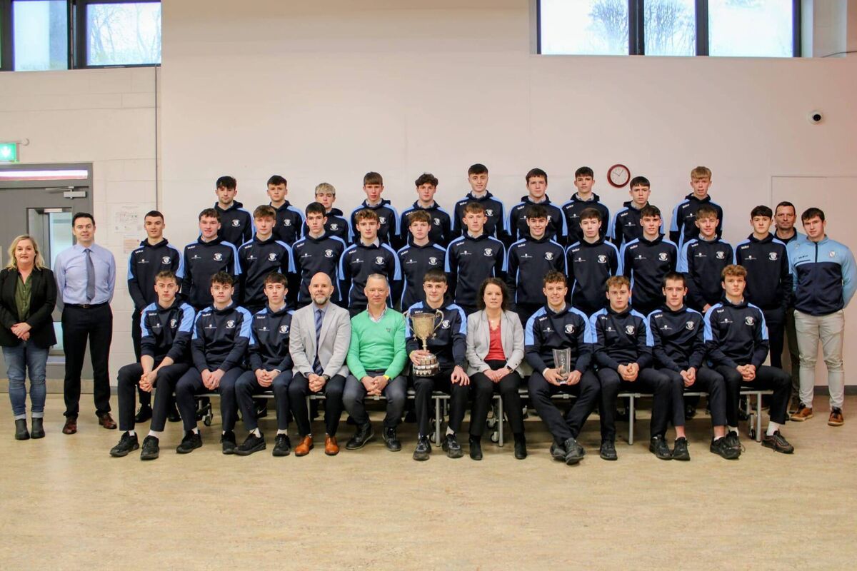 Presentation of leisure tops by Aidan Hennessy of Hennessy Timber Group to Clonakilty Community College Simcox Cup winning squad.