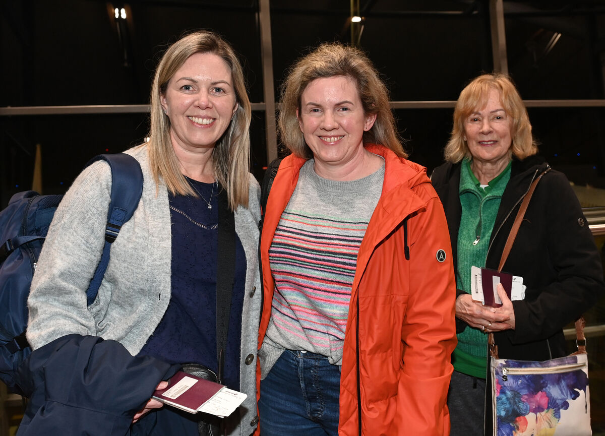Toni Kelly with daughters Yvonne Broderick and Jean O'Neill boarding their charter flight.