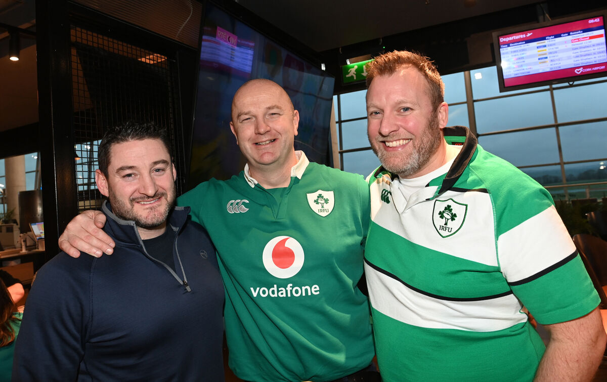 Rugby fans Keith Matthews and James O'Neill of UL Bohs, and Liam Woulfe of Young Munster waiting their flight from Cork to Paris for the international clash with France. Picture: Larry Cummins.