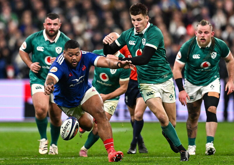 Rodrigue Neti of France in action against Sam Prendergast of Ireland. Picture: Ramsey Cardy/Sportsfile