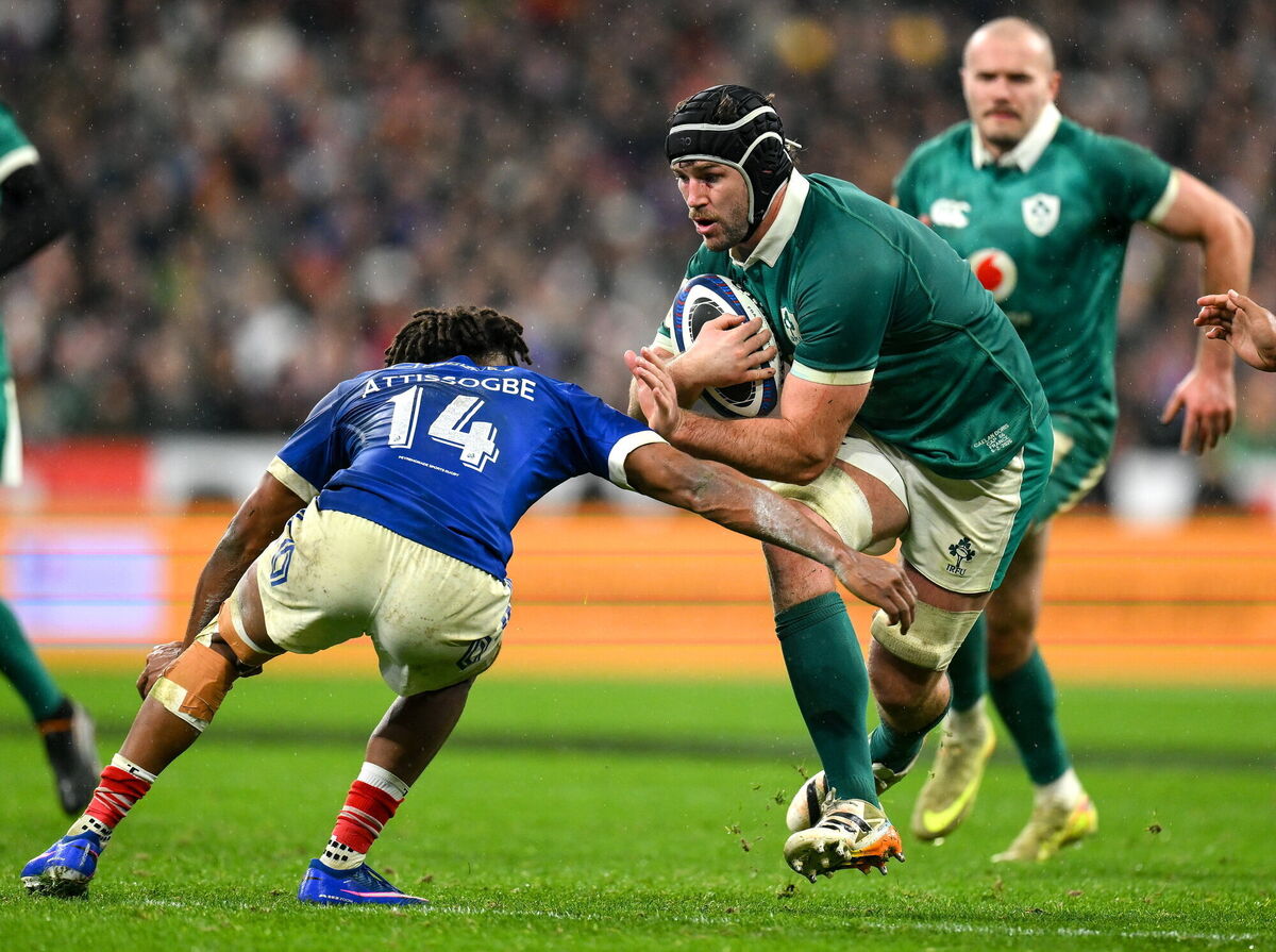 Caelan Doris of Ireland is tackled by Théo Attissogbe of France. Picture: Brendan Moran/Sportsfile