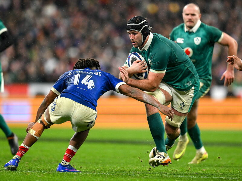 Caelan Doris of Ireland is tackled by Théo Attissogbe of France. Picture: Brendan Moran/Sportsfile