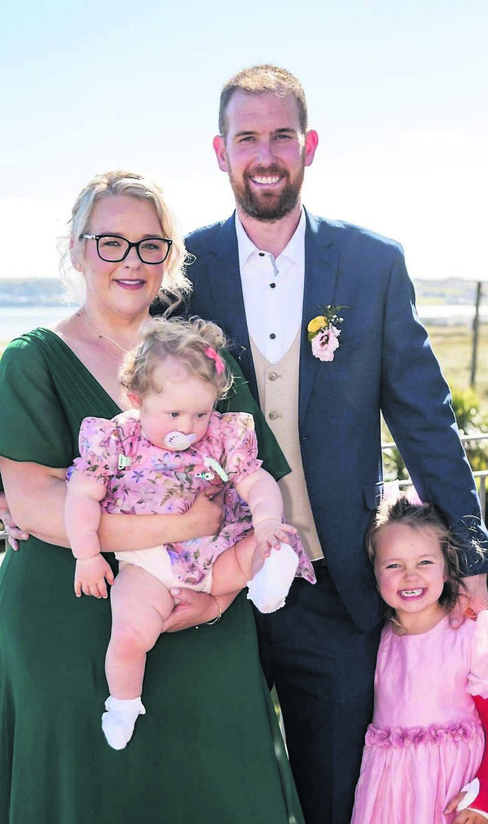 Baby Harper Hackett with mum Tracey, dad Dave and sister Robyn