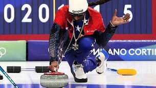 Stone cold clean sweep for Snoop Dogg as he tries curling at Winter Olympics
