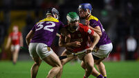 David O'Leary is tackled by Sean O'Brien and Darragh Ryan 7/2/2026