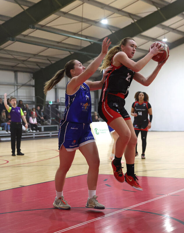  Saidbh Fitzgerald, Fr Mathew's, grabs possession from Alexandra Mulligan, Cavan Eagles. Picture: Jim Coughlan.