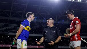 <p>Tipperary's Jake Morris with Referee Liam Gordon and Cork's Darragh Fitzgibbon at the coin toss. Picture: INPHO/Ben Brady</p>