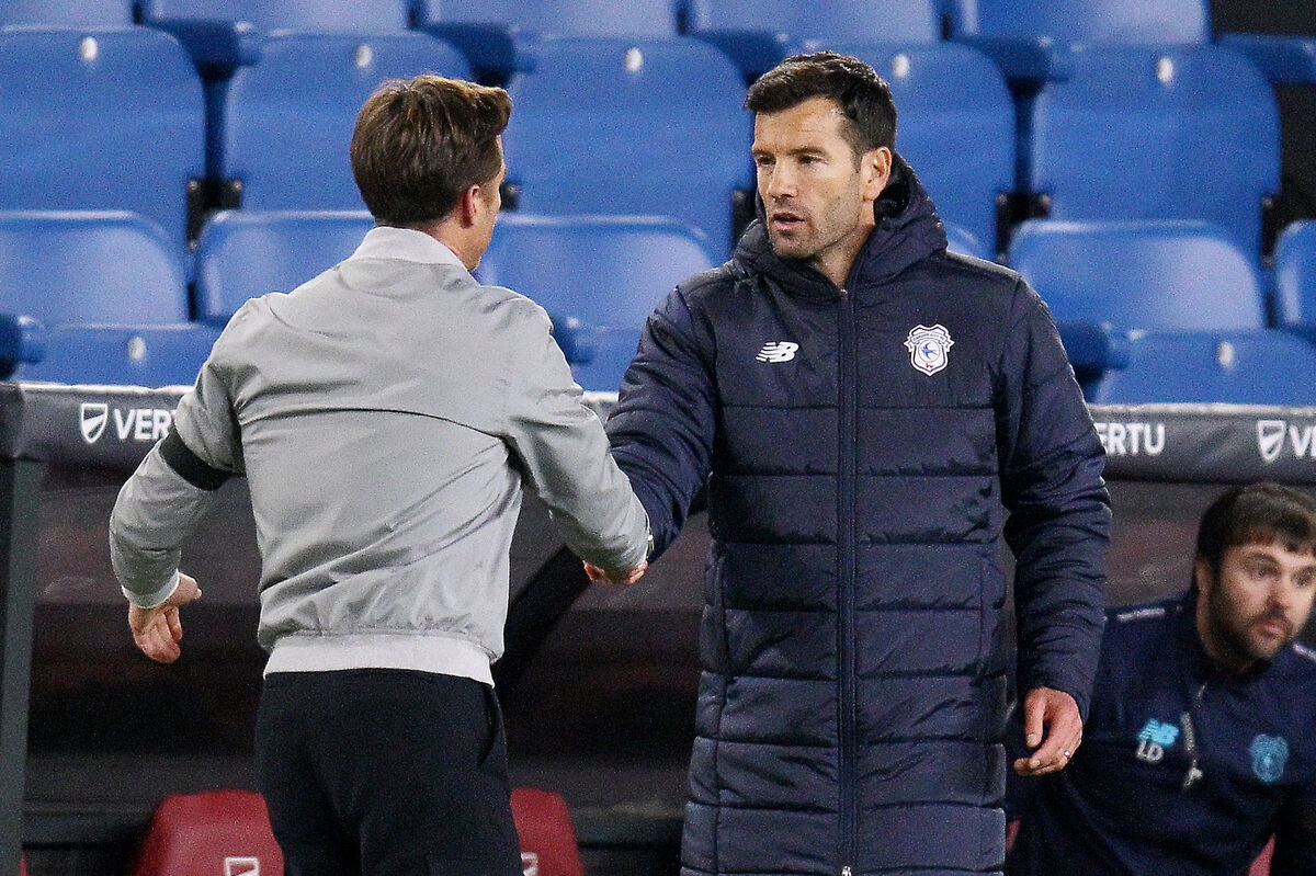 Burnley manager Scott Parker (left) and Cardiff City manager Brian Barry-Murphy embrace after the Carabao Cup third round match at Turf Moor, Burnley. Burnley manager Scott Parker (left) and Cardiff City manager Brian Barry-Murphy embrace after the Carabao Cup third round match at Turf Moor, Burnley.