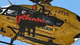 Lindsey Vonn airlifted off mountain after crashing in Olympic women’s downhill