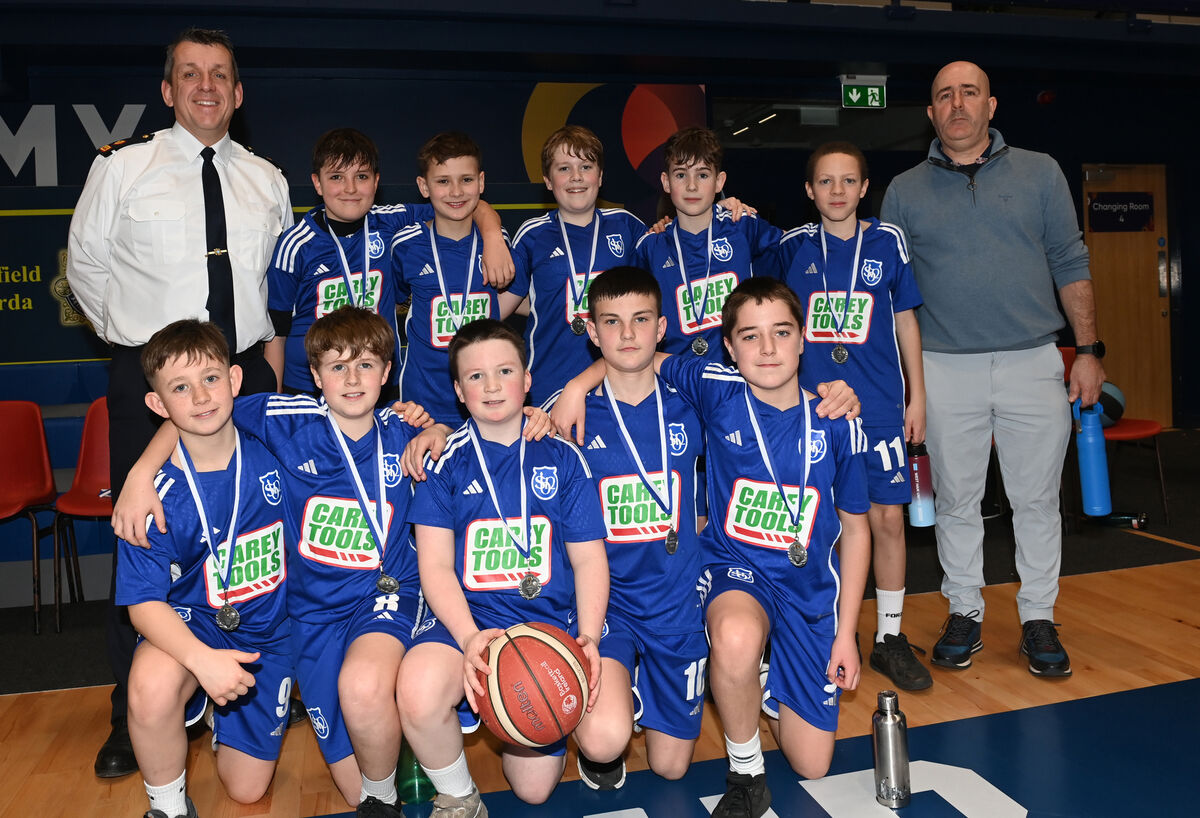  Garda Supt Conor Dillon with the cup final runners-up from Beaumont BNS.