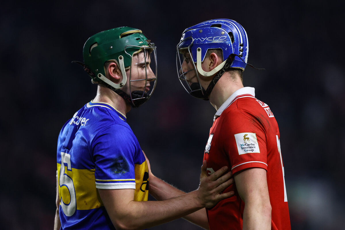 Tipperary's Sam O'Farrell after the game with Diarmuid Healy of Cork. Picture: INPHO/Ben Brady