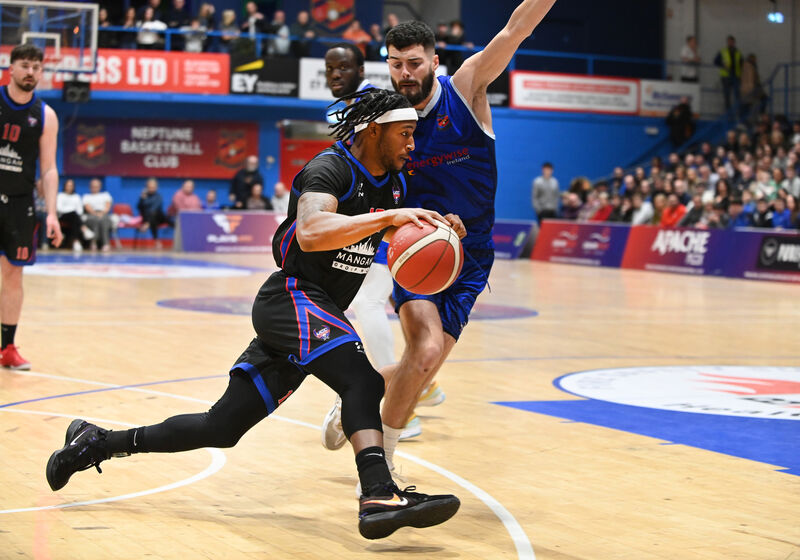 UCC Demons' Patrick Robinson takes on Energywise Ireland Neptune's Darragh O'Sullivan during the Men's Super League at a packed Neptune stadium. Picture: Eddie O'Hare