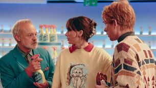 <p>Graham Norton with Taylor Swift and Domhnall Gleeson in the Opalite music video.</p>