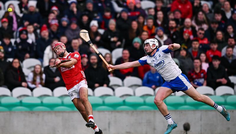 William Buckley of Cork scores a point despite the attention of Shane Bennett of Waterford. Picutre: Ben McShane/Sportsfile