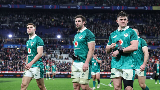<p>Ireland's Jack Crowley, Caelan Doris and Dan Sheehan dejected after the loss in Paris. Picture: INPHO</p>