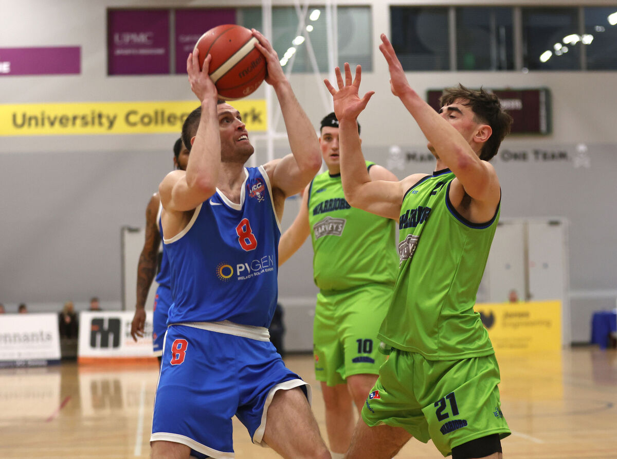  Kyle Hosford, UCC Demons, takes on Steve Bowler, Tralee. Picture: Jim Coughlan.