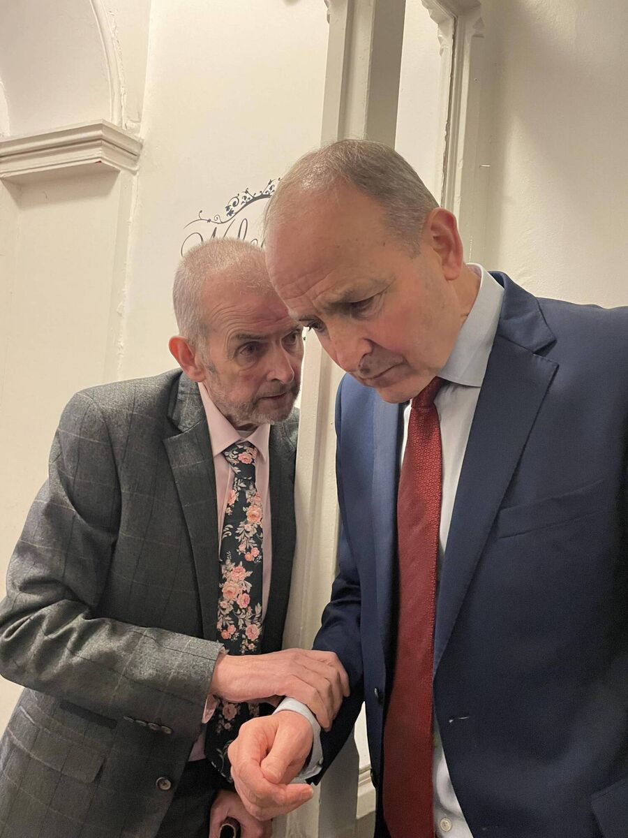 The late Don O'Leary in conversation with Taoiseach Micheál Martin. 