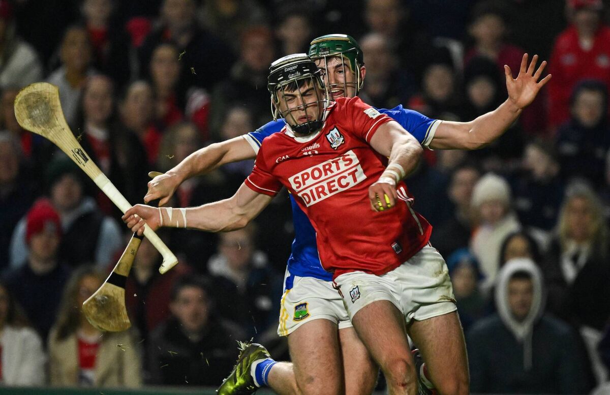 Darragh Fitzgibbon of Cork is tackled by Sam O'Farrell of Tipperary. Picture: Ray McManus/Sportsfile
