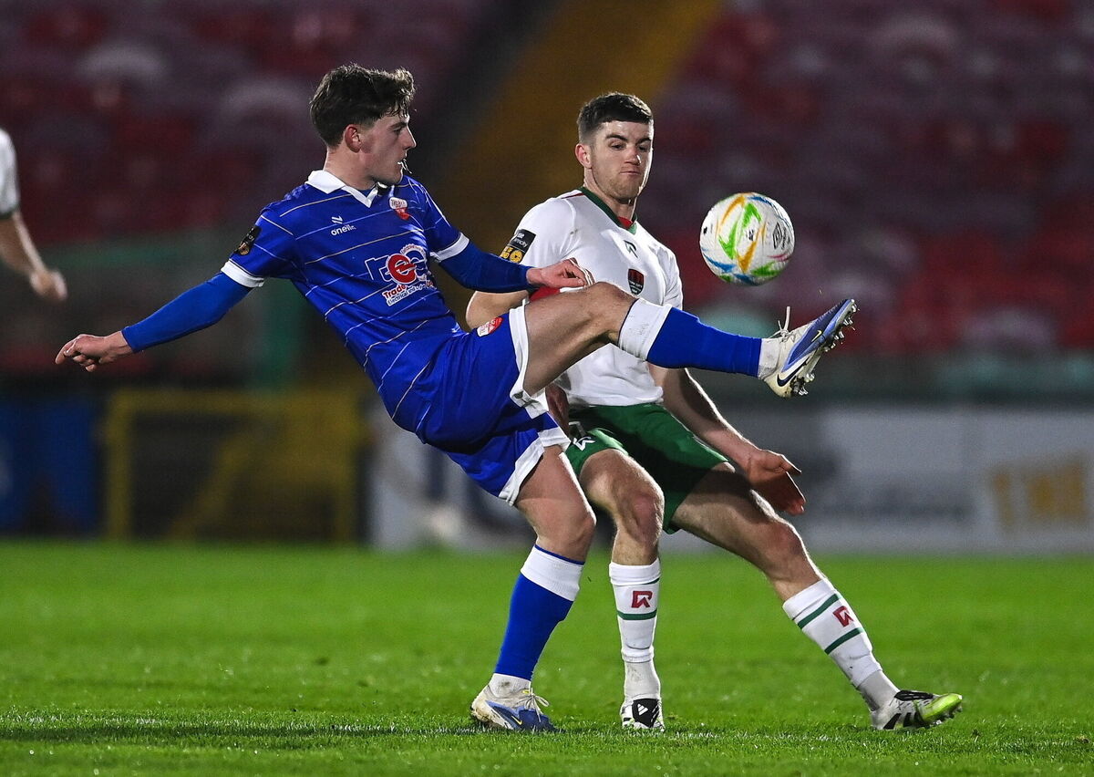 Mark Murphy of Treaty United in action against Darragh Crowley of Cork City. Picture: Matt Browne/Sportsfile