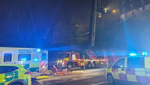 <p>Members of Cork City Fire Brigade used a hydraulic platform to perform "a long and complicated rescue" on Saturday night after a man fell more than 30 feet. Picture: Cork City Fire Brigade</p>
