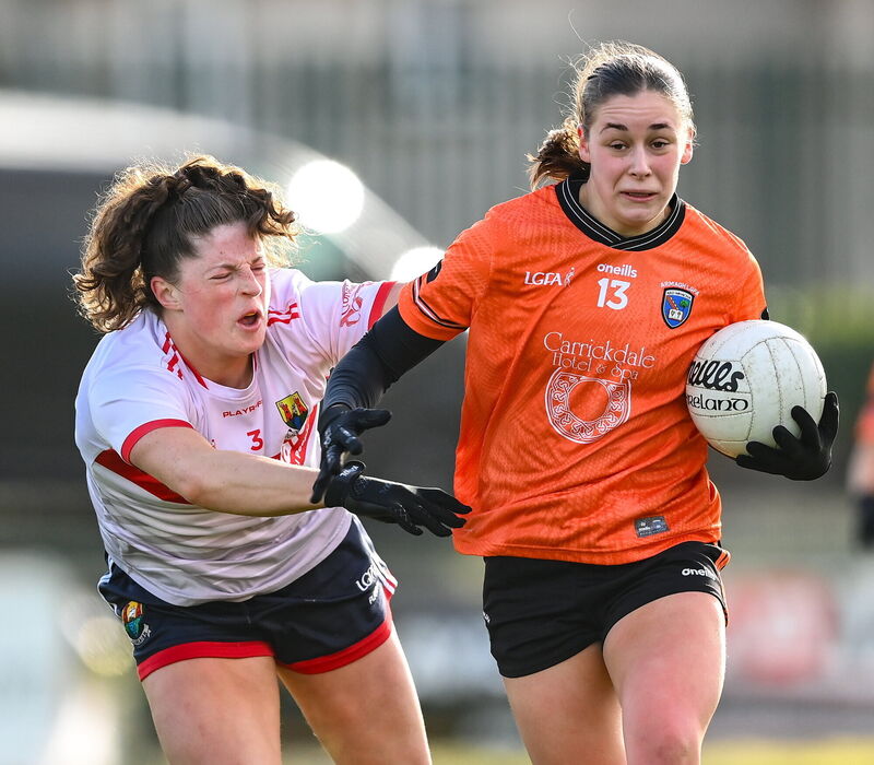 Maeve Lennon of Armagh tries to hold off Dara Kiniry of Cork. Picture: Stephen McCarthy/Sportsfile Maeve Lennon of Armagh tries to hold off Dara Kiniry of Cork. Picture: Stephen McCarthy/Sportsfile