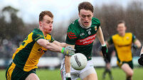 Donnacha McHugh and Donegal's  Conor McCahill 15/2/2026