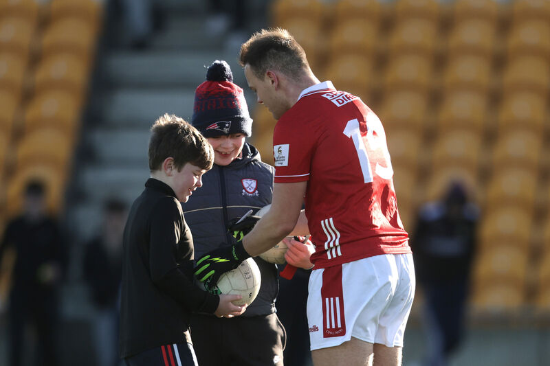 Cork's Steven Sherlock signs an autograph for supporters after the game in Tullamore. Picture: INPHO/Bryan Keane