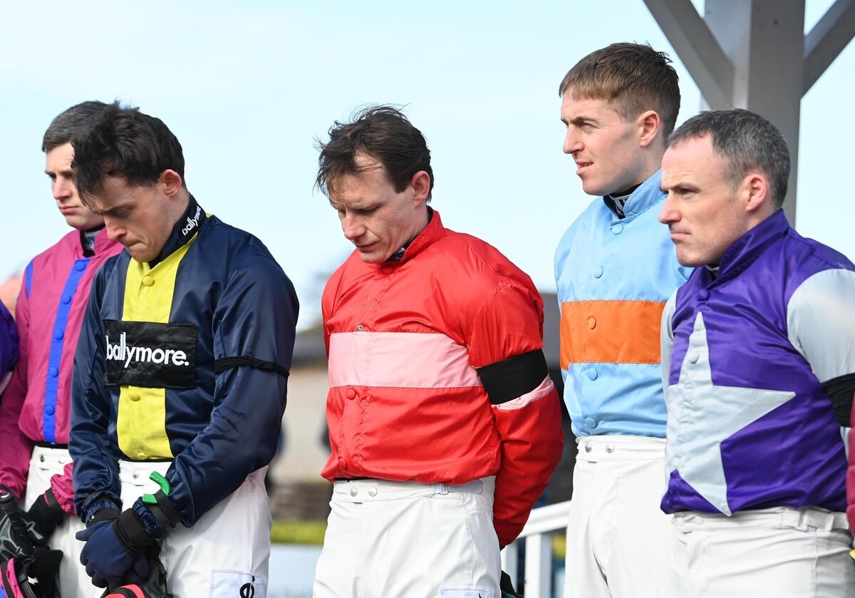 Jockeys observe a minutes silence in memory of Michael O'Sullivan
