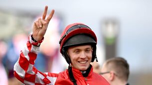 <p>Jockey Michael O'Sullivan, celebrates his second win, after winning the Boodles Juvenile Handicap Hurdle Chase during day one of the Cheltenham Racing Festival at Prestbury Park in Cheltenham, England. Photo by Seb Daly/Sportsfile</p>
