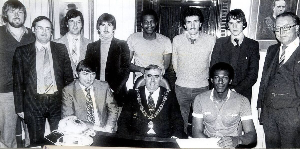 Blue Demons National League winning team of 1981 on a courtesy visit to The Lord Mayor's Chambers in 1981. Back: Andrew Houlihan, Jim Dineen, Barry Deasy, Joe Coughlan, Wayne Williams, Tom Wilkinson, Tim McCarthy, Brian Feeney. Front: Peter Coughlan (coach), Lord Mayor Toddy O'Sullivan, Davis Beckham. Blue Demons National League winning team of 1981 on a courtesy visit to The Lord Mayor's Chambers in 1981. Back: Andrew Houlihan, Jim Dineen, Barry Deasy, Joe Coughlan, Wayne Williams, Tom Wilkinson, Tim McCarthy, Brian Feeney. Front: Peter Coughlan (coach), Lord Mayor Toddy O'Sullivan, Davis Beckham.