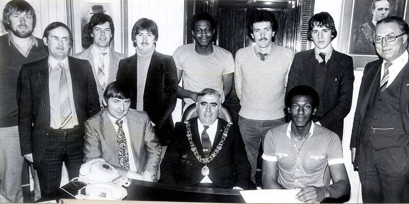 Blue Demons National League winning team of 1981 on a courtesy visit to The Lord Mayor's Chambers in 1981. Back: Andrew Houlihan, Jim Dineen, Barry Deasy, Joe Coughlan, Wayne Williams, Tom Wilkinson, Tim McCarthy, Brian Feeney. Front: Peter Coughlan (coach), Lord Mayor Toddy O'Sullivan, Davis Beckham. Blue Demons National League winning team of 1981 on a courtesy visit to The Lord Mayor's Chambers in 1981. Back: Andrew Houlihan, Jim Dineen, Barry Deasy, Joe Coughlan, Wayne Williams, Tom Wilkinson, Tim McCarthy, Brian Feeney. Front: Peter Coughlan (coach), Lord Mayor Toddy O'Sullivan, Davis Beckham.