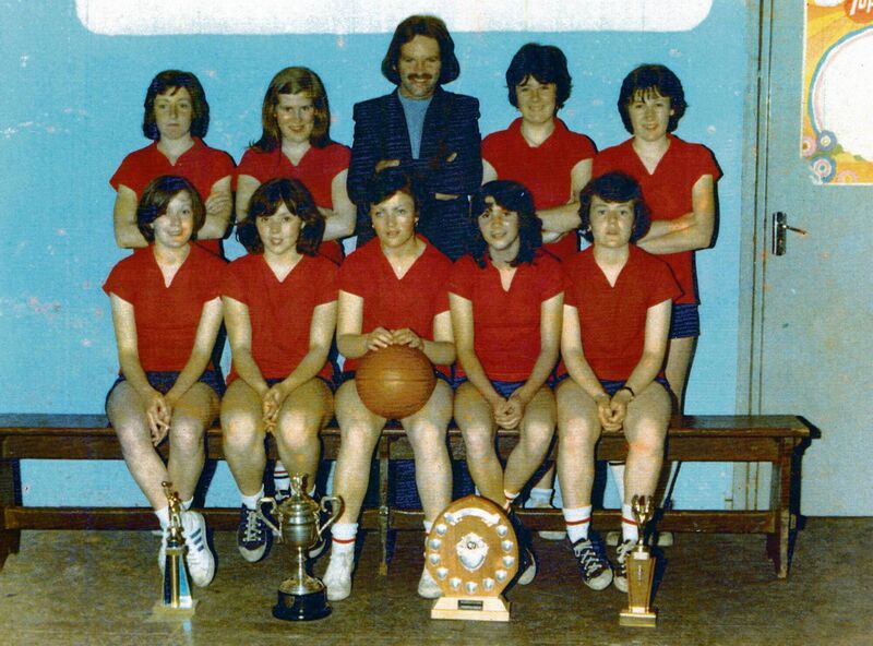 Blue Demons Ladies Basketball team, Cork Senior champions and All-Ireland Junior Blitz winners in 1976. Back: Clare Twomey, Hannah O'Driscoll, Dommie Mullins (coach), Angela Duke, Marie Long. Front: Ber Cronin, Rose McCarthy, Julie Knowles, Mary Fitzgibbon, Liz O'Callaghan. Photo supplied. Blue Demons Ladies Basketball team, Cork Senior champions and All-Ireland Junior Blitz winners in 1976. Back: Clare Twomey, Hannah O'Driscoll, Dommie Mullins (coach), Angela Duke, Marie Long. Front: Ber Cronin, Rose McCarthy, Julie Knowles, Mary Fitzgibbon, Liz O'Callaghan. Photo supplied.
