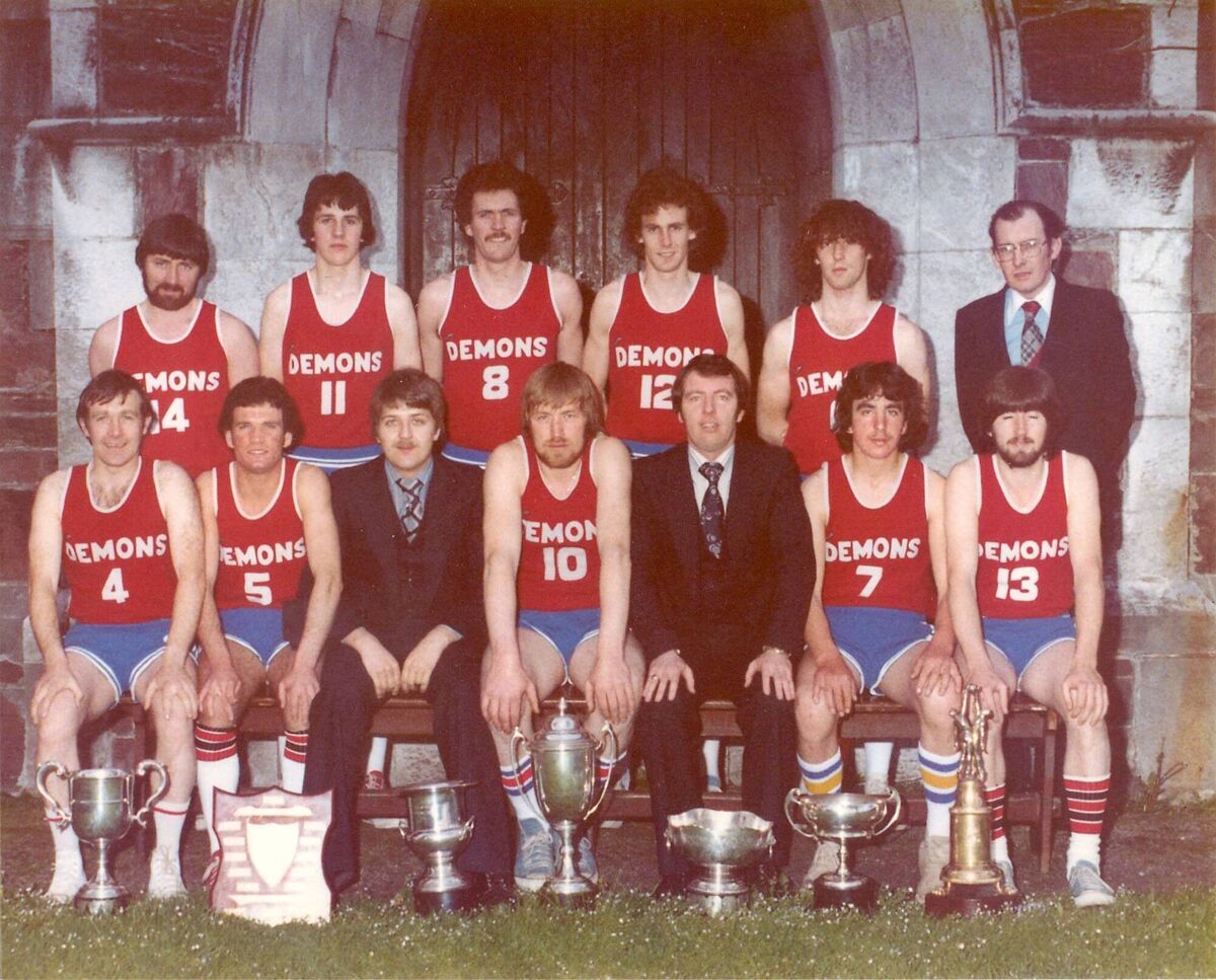 The 1979 Blue Demons side, who won seven senior titles that year. They were the Cork Senior league and championship, the Munster Senior League, the John Dowd Tournament, Ted Keane Tournament, the Lota tournament and the national cup /Back row left: P Coughlan, T. McCarthy, T. Wilkinson, G. Wheeler, Pat Collins, M. o'Sullivan (treasurer).Front Left Sean Murphy, Denis Caffrey, Bill Ramsell, Andy Houlan, D.Byrnes, Mono McCarthy, Joe Coughlan. The 1979 Blue Demons side, who won seven senior titles that year. They were the Cork Senior league and championship, the Munster Senior League, the John Dowd Tournament, Ted Keane Tournament, the Lota tournament and the national cup /Back row left: P Coughlan, T. McCarthy, T. Wilkinson, G. Wheeler, Pat Collins, M. o'Sullivan (treasurer).Front Left Sean Murphy, Denis Caffrey, Bill Ramsell, Andy Houlan, D.Byrnes, Mono McCarthy, Joe Coughlan.