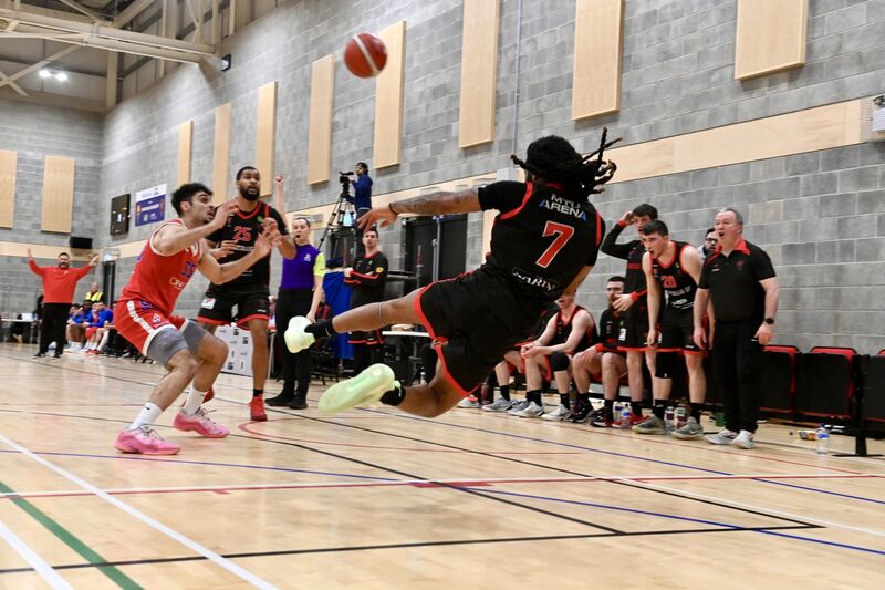  Latrell Jossell tries to keep the ball in play for Ballincollig. Ballincollig vs UCC Demons in the Domino’s Men’s Superleague basketball at MTU Arena. Picture: Larry Cummins