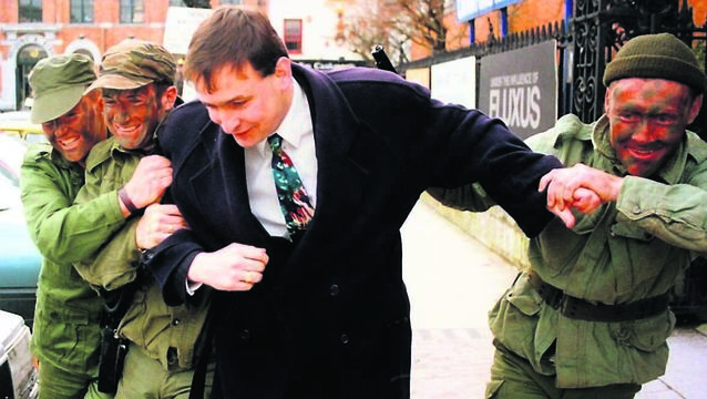 <p class="contextmenu internal_Caption">Fianna Fáil TD Micheál Martin is ‘kidnapped’ during Rag Week in 1995</p>