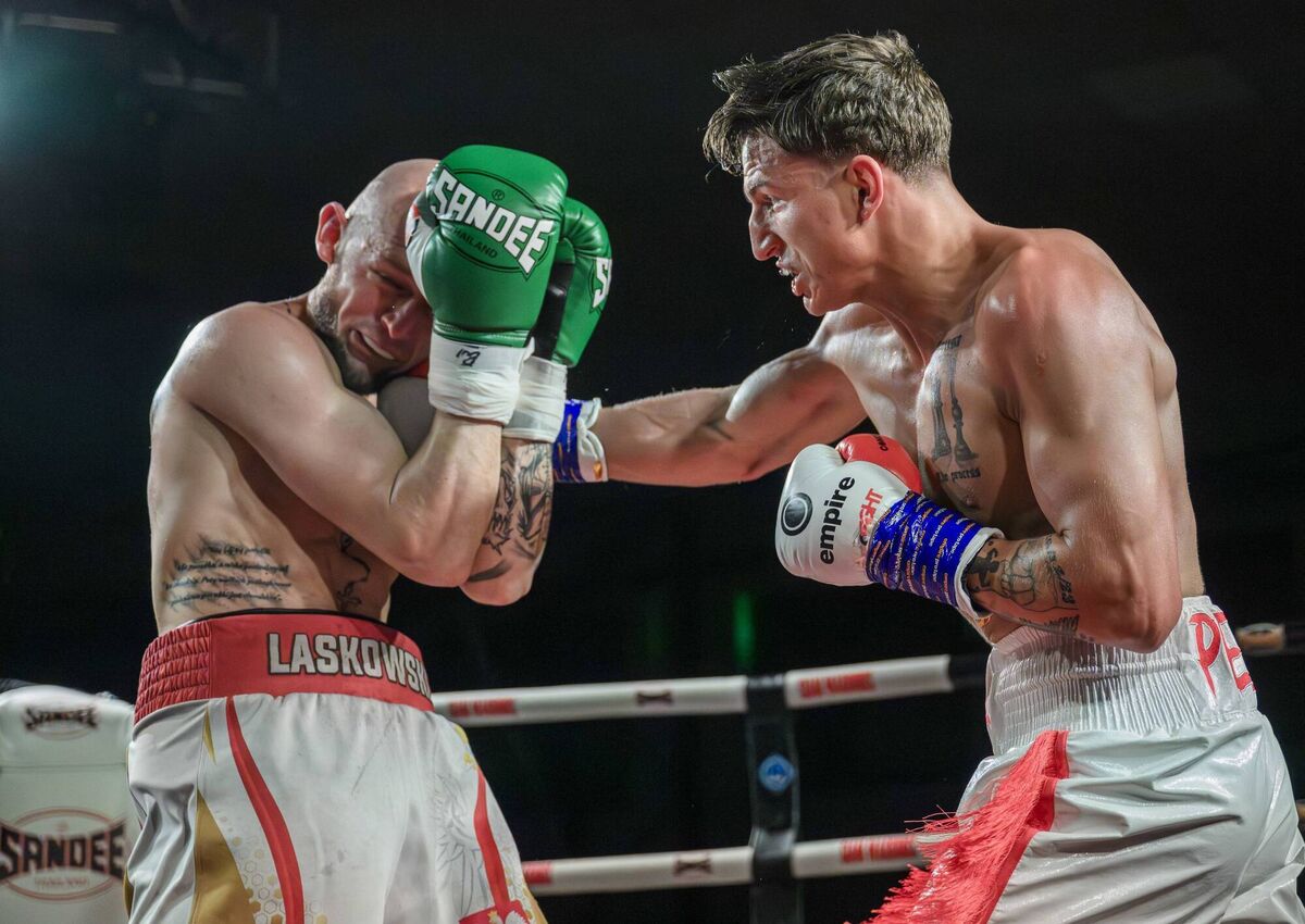 Kuba Pielesz Vs Jakub Laskowski, — — Cork Boxer Kuba Pielesz, on his pro debut, in action against Jakub Laskowski of Poland on the Siam Warriors Promotions Card at the Parochial Hall. Picture: Doug Minihane