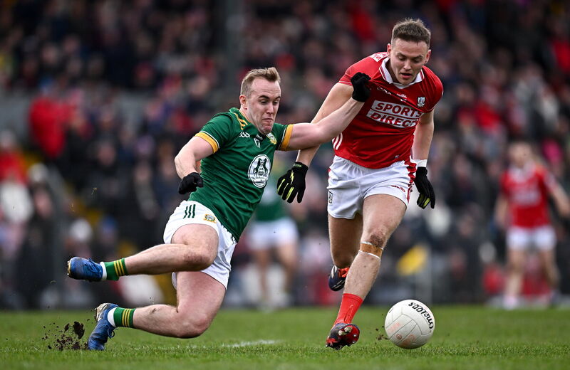 Ronan Ryan of Meath in action against Steven Sherlock of Cork. Picture: Seb Daly/Sportsfile Ronan Ryan of Meath in action against Steven Sherlock of Cork. Picture: Seb Daly/Sportsfile