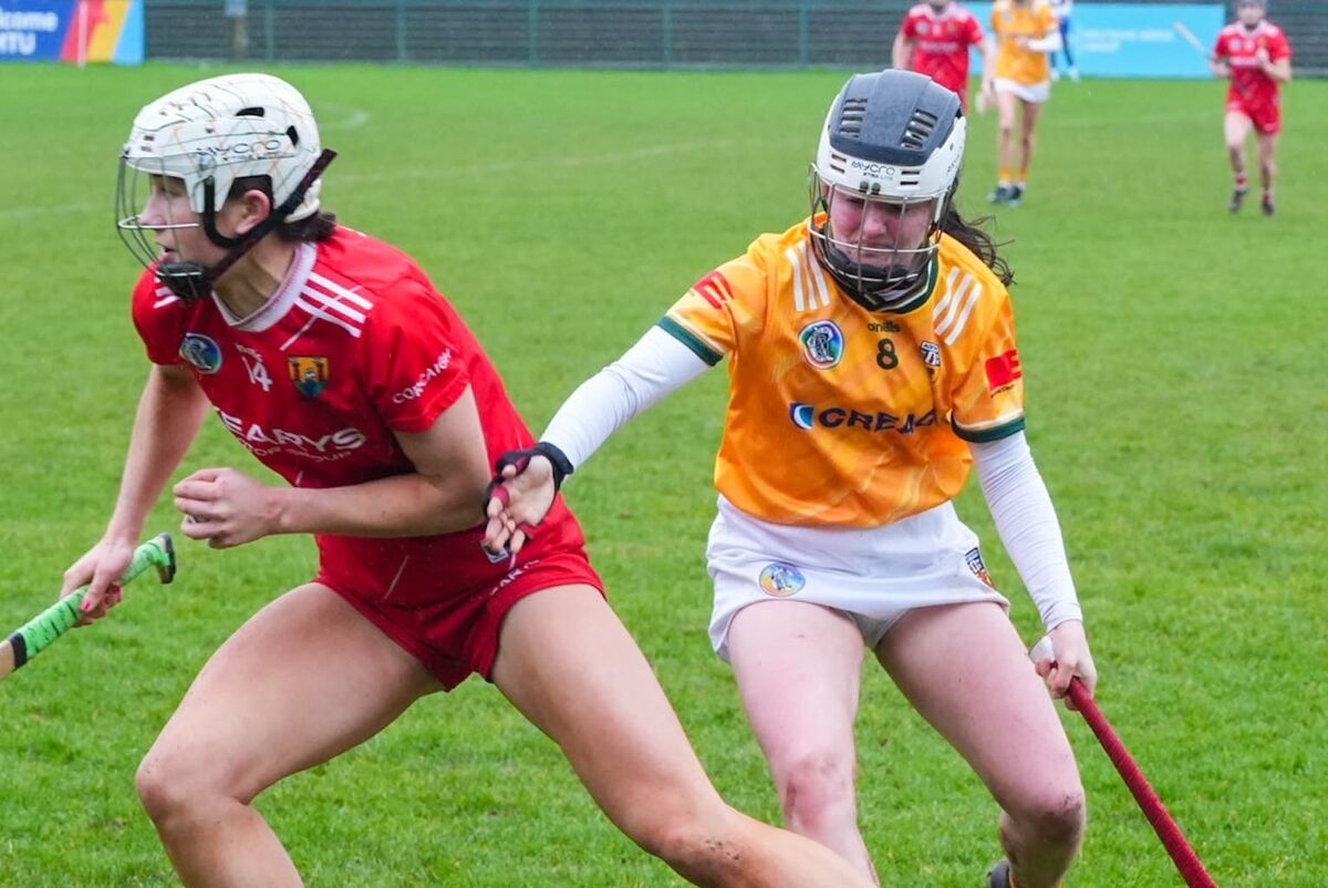 Aisling Egan of Cork breaks away from Amy Boyle of Antrim. Picture: Noel Sweeney