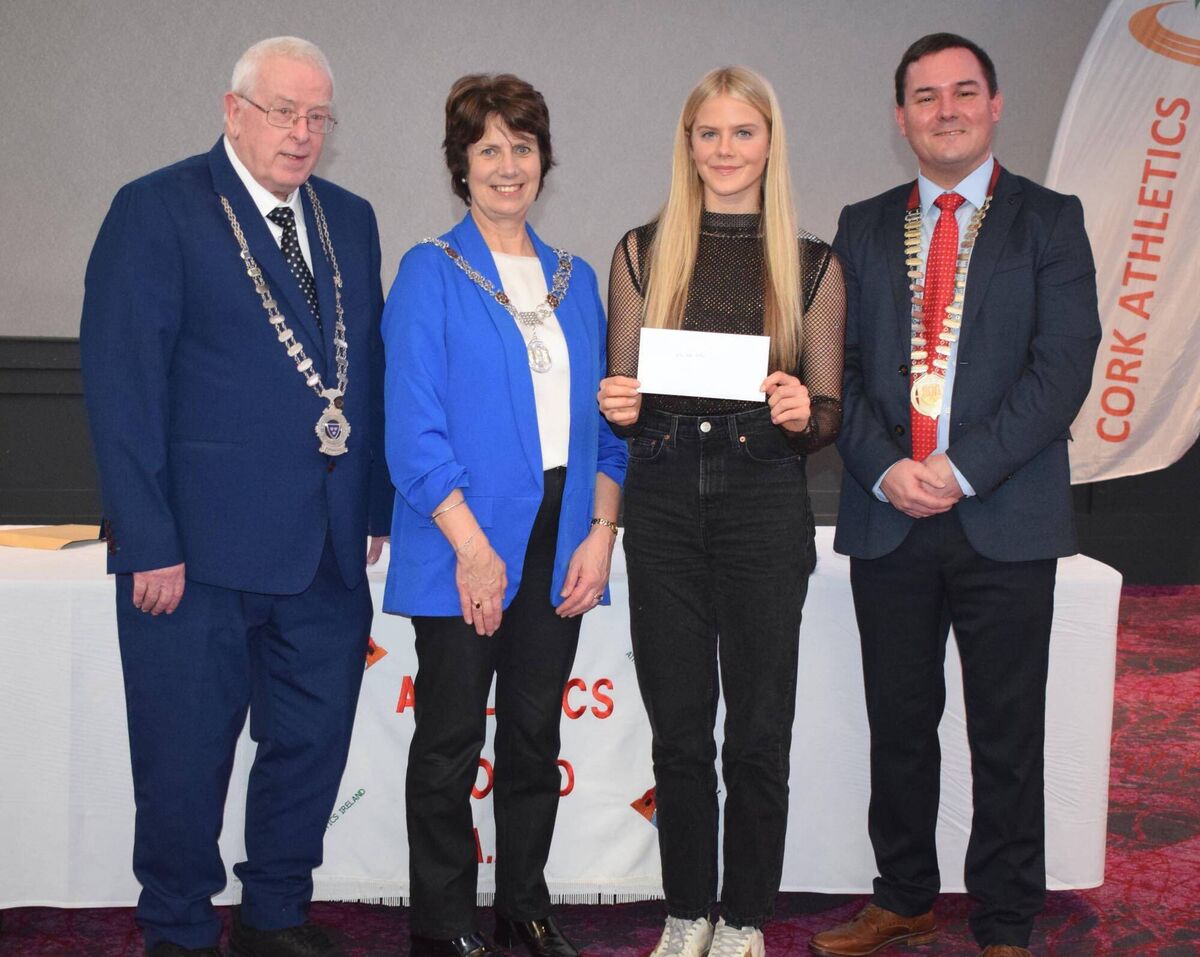 Ellie-Kate McRea from the Midleton club, one of the 29 Aspiring Awards Winners, with Mossie Woulfe, President Munster Athletics; Cllr Margaret McDonnell, Deputy Cork Lord Mayor; and Michael Flynn, Chairperson, Cork Athletics. Picture: John Walshe 