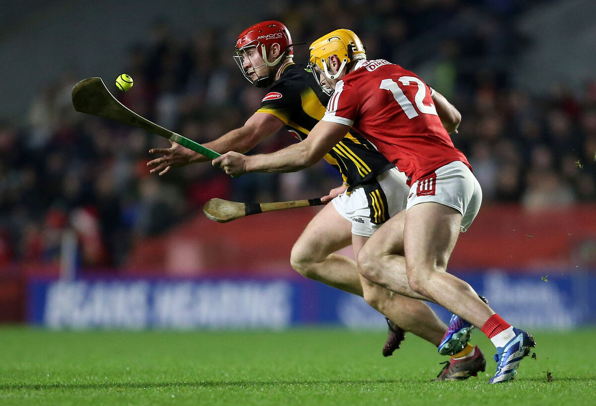 Kilkenny's Adrian Mullen in action against Cork's Sean Twomey during last year's league match. Picture: ©Inpho/Ken Sutton