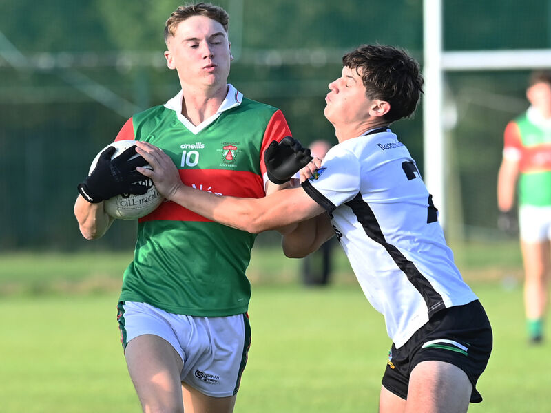 Ballinora's Mark O'Brien holds on tight to the ball as Killian O'Sullivan of Gabriel Rangers gets up close last season. Picture: Martin Walsh