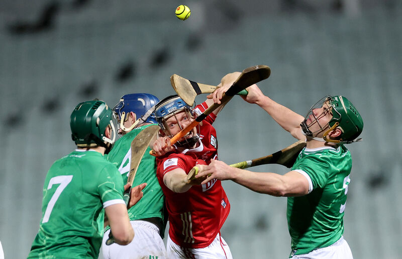 Limerick’s Matthew Fitzgerald, Eddie Stokes and Chris Thomas with Cian Darcy of Cork. Picture: INPHO/James Crombie