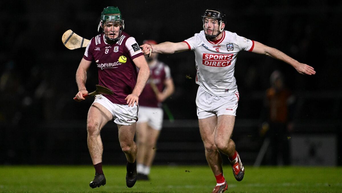 Gavin Lee of Galway is tackled by Eoin Downey of Cork. Picture: Ben McShane/Sportsfile Gavin Lee of Galway is tackled by Eoin Downey of Cork. Picture: Ben McShane/Sportsfile